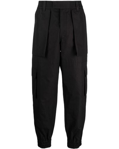 Alexander McQueen Pantalon en coton à poches cargo - Noir
