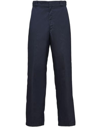 Prada Pantalones rectos con placa del logo - Azul