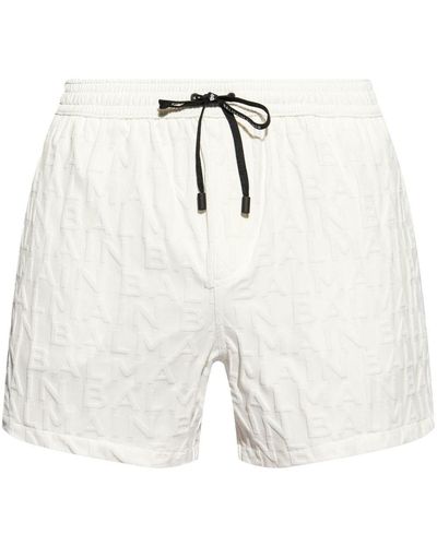 Balmain Shorts denim con logo goffrato - Bianco