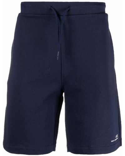 A.P.C. Pantalones cortos de deporte con logo estampado - Azul