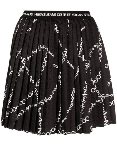 Versace Falda plisada con cadena - Negro
