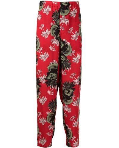 Undercover Pantalones con palmeras estampadas - Rojo