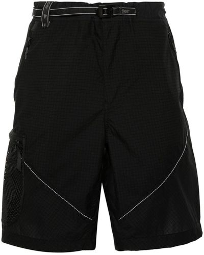 and wander Shorts con stampa - Nero