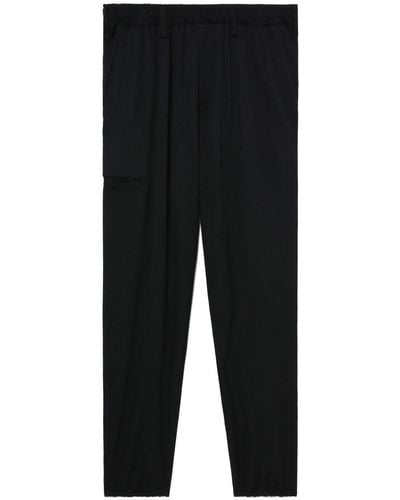 Yohji Yamamoto Pantalones con parche del logo - Negro