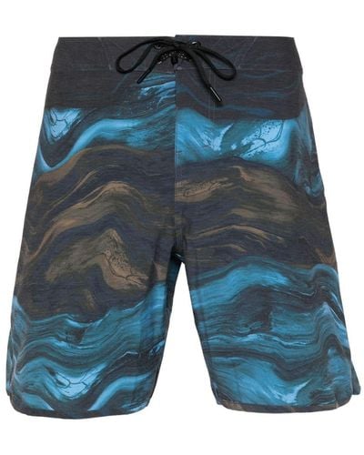 Oakley Badeshorts mit abstraktem Muster - Blau