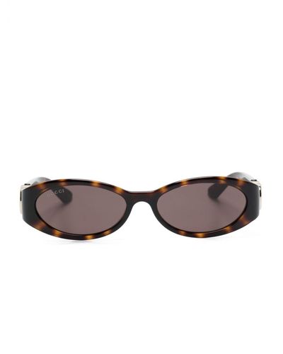 Gucci Sonnenbrille mit ovalem Gestell - Braun