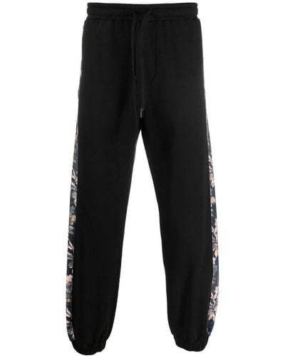 Versace Jeans Couture Pantalon de jogging à fleurs - Noir