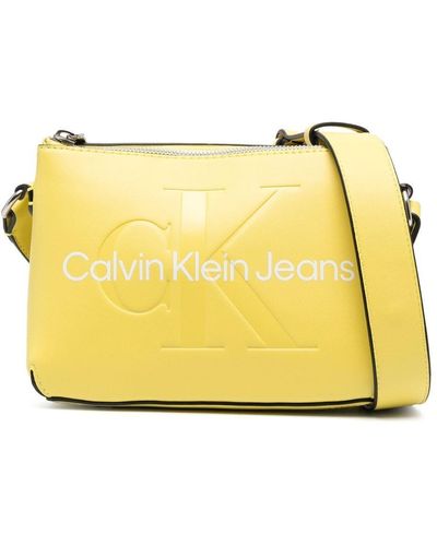 Calvin Klein Embossed-logo Faux-leather Crossbody Bag - Yellow