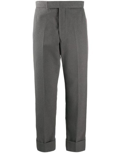 Thom Browne Pantalones con franjas laterales - Gris