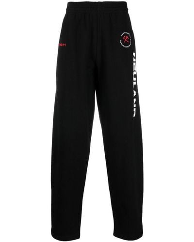 GmbH Pantalon de jogging en coton biologique à logo imprimé - Noir