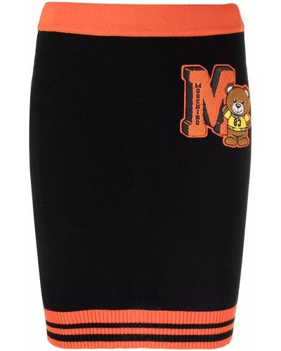 Moschino Jupe en maille à patch logo - Noir