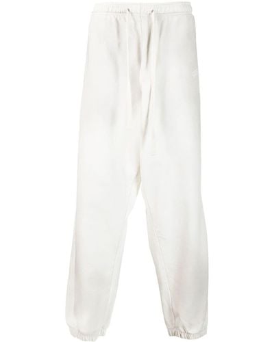 Guess USA Pantalon de jogging en coton à logo imprimé - Blanc