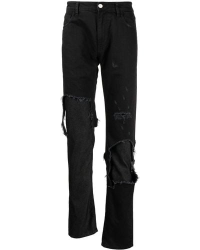 Raf Simons Jeans slim con effetto vissuto - Nero