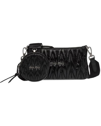 Miu Miu Pochette matelassée à plaque logo - Noir