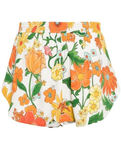 Stella McCartney Pantalones cortos de chándal con estampado floral - Gris