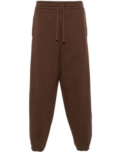 Gucci Pantalon de jogging en coton à motif GG Supreme - Marron