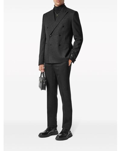 Versace Pantalones ajustados con motivo en jacquard - Negro