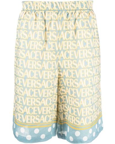 Versace Pantalones cortos con motivo Allover - Neutro