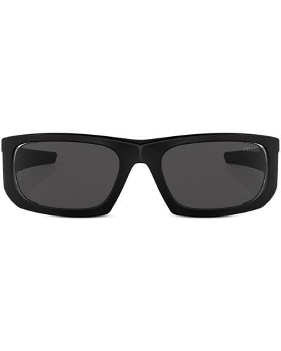 Prada Linea Rossa Sonnenbrille mit Logo-Print - Schwarz