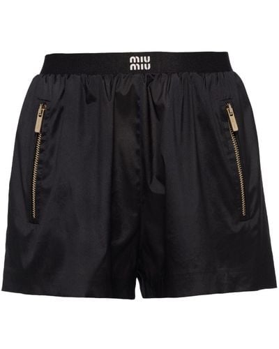 Miu Miu Pantalones cortos de deporte con logo en la cinturilla - Negro