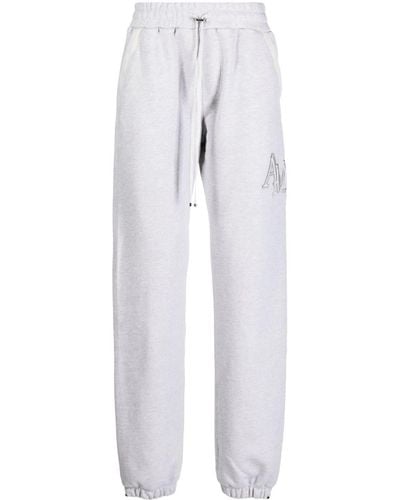 Amiri Staggered Logo-embroidered Track Trousers - White