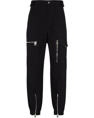 Alexander McQueen Pantalones ajustados con cremalleras - Negro
