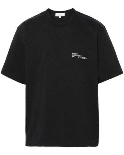 Studio Nicholson T-Shirt mit Logo-Print - Schwarz