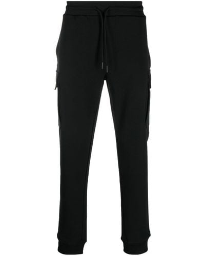 Woolrich Pantalon de jogging cargo à logo imprimé - Noir