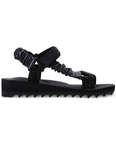 KG by Kurt Geiger Sandalias planas con aplique de strass - Negro