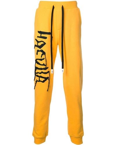 Haculla Pantalones deportivos con logo bordado - Amarillo