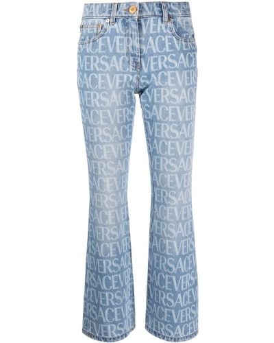 Versace Mid-rise Logo-print Bootcut Jeans - Blue