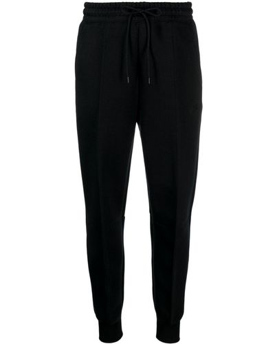 Women's Nike Track pants and sweatpants from $50