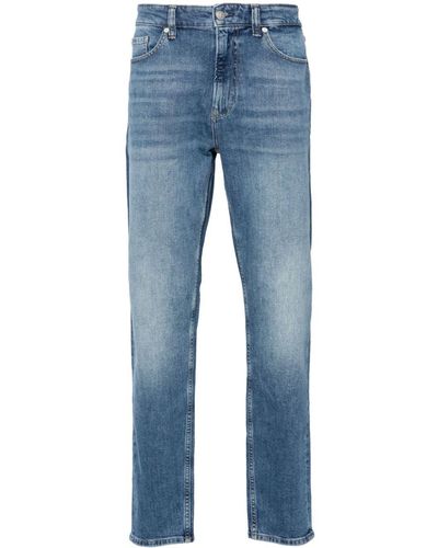 Calvin Klein Mid-rise Tapered Jeans - Blue