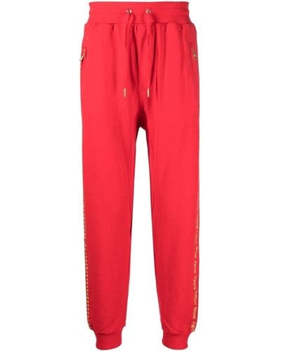 Ksubi Pantalones de chándal con eslogan bordado - Rojo