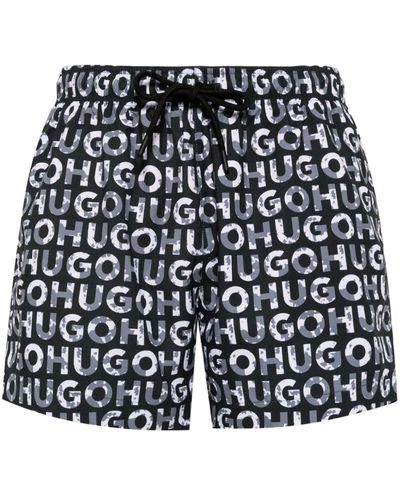 HUGO Shorts mit durchgehendem Logo-Print - Schwarz