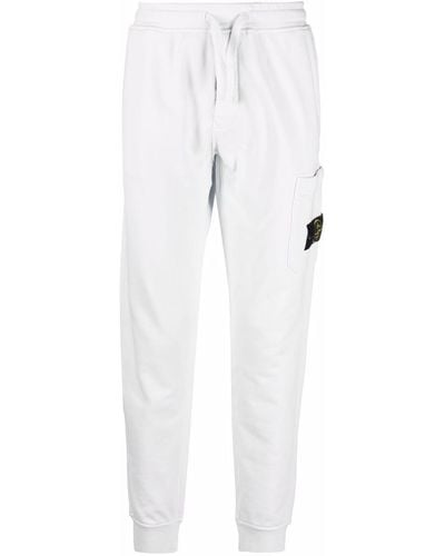Stone Island Pantalones de chándal con cintura acordonada y parche del logo - Blanco
