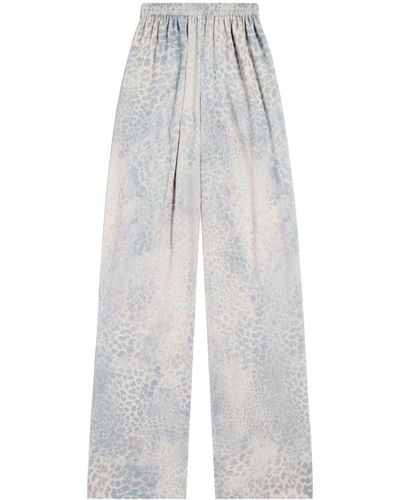 Balenciaga Pantalones de chándal con estampado de leopardo - Blanco