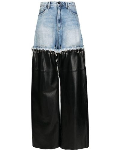 Natasha Zinko Ausgeblichene Jeans mit Ledereinsätzen - Blau