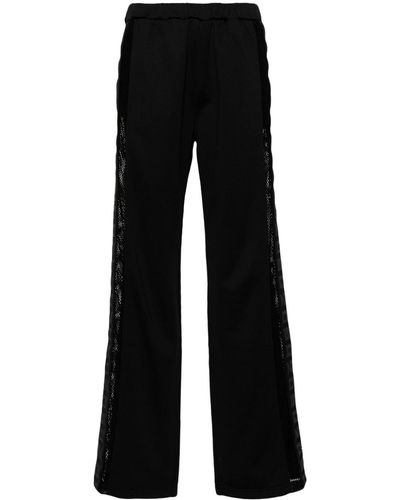 DSquared² Pantalones de chándal con franjas del logo - Negro