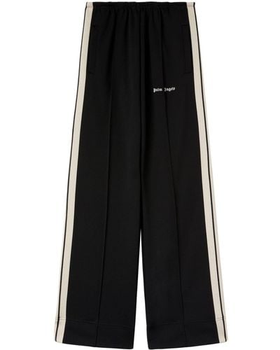 Palm Angels Pantalones de chándal con rayas laterales - Negro