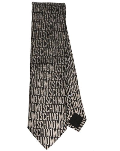Moschino Cravate en soie à logo jacquard - Noir