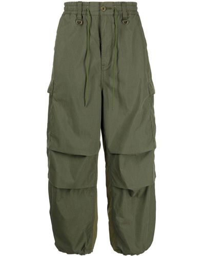 MASTERMIND WORLD Pantalones con logo estampado - Verde