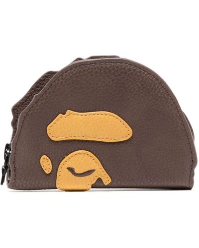 A Bathing Ape Porte-monnaie Ape Head en cuir - Marron