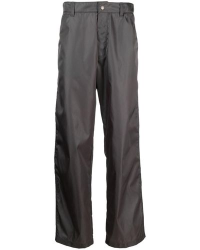Prada Pantalon droit à plaque logo - Gris