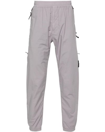 Stone Island Pantalones de chándal con distintivo Compass - Gris