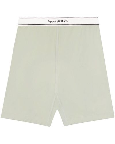 Sporty & Rich Serif Shorts Met Logoband - Wit