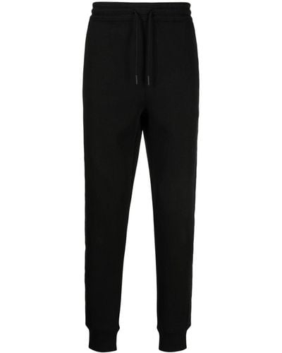 HUGO Pantalones de chándal con franjas del logo - Negro