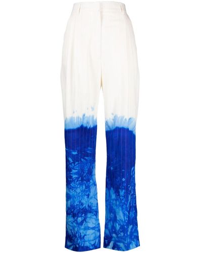Stain Shade Pantalones de traje tie-dye - Azul