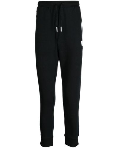 BOSS Pantaloni sportivi con applicazione - Nero