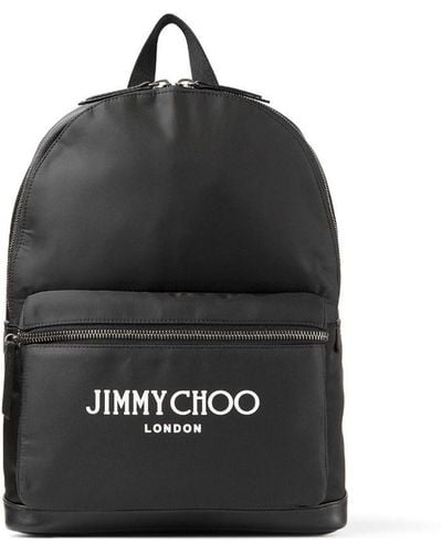 Jimmy Choo Sac à dos à logo imprimé - Noir